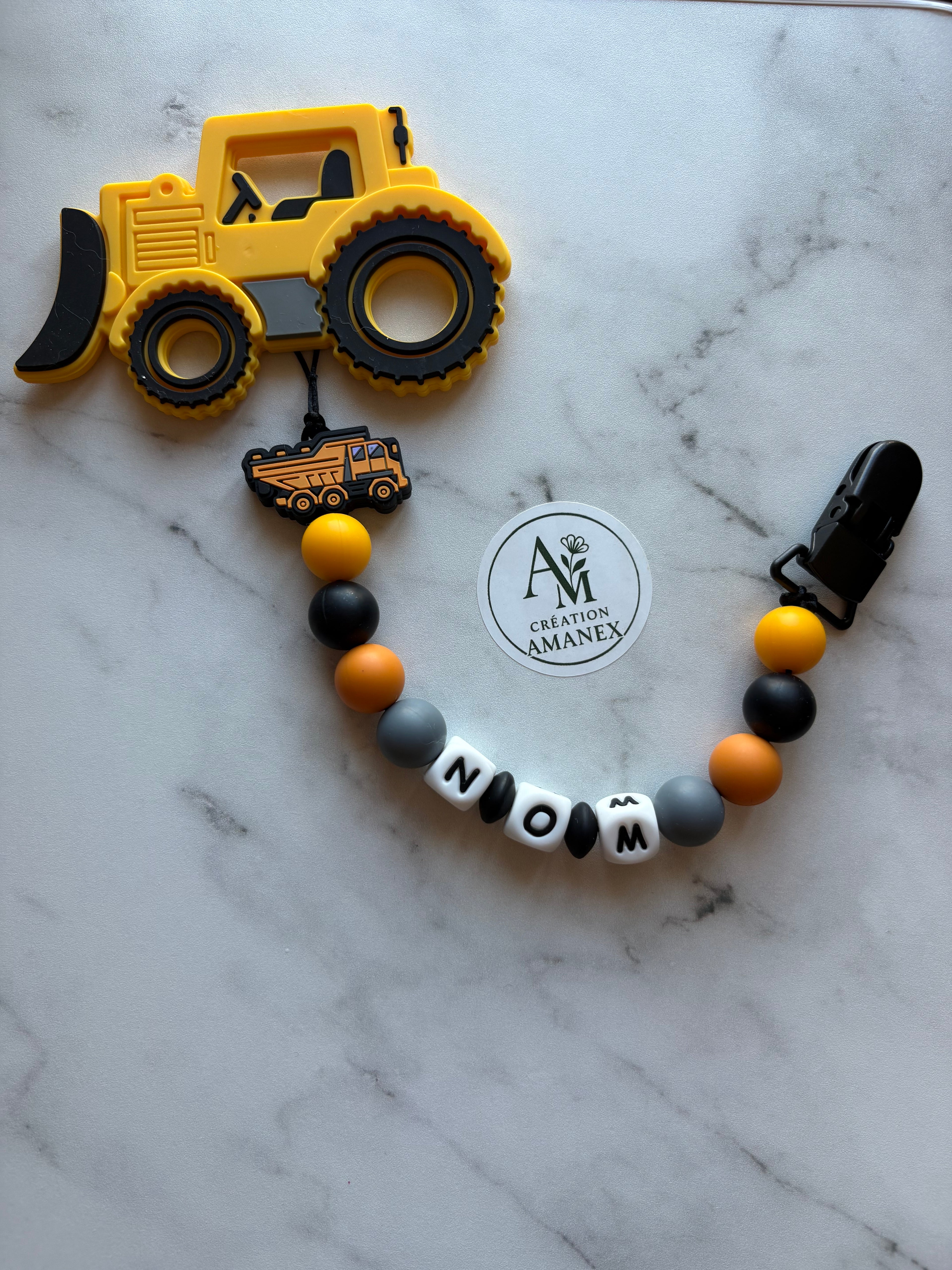 Attache suce et Jouet de dentition Chargeuse