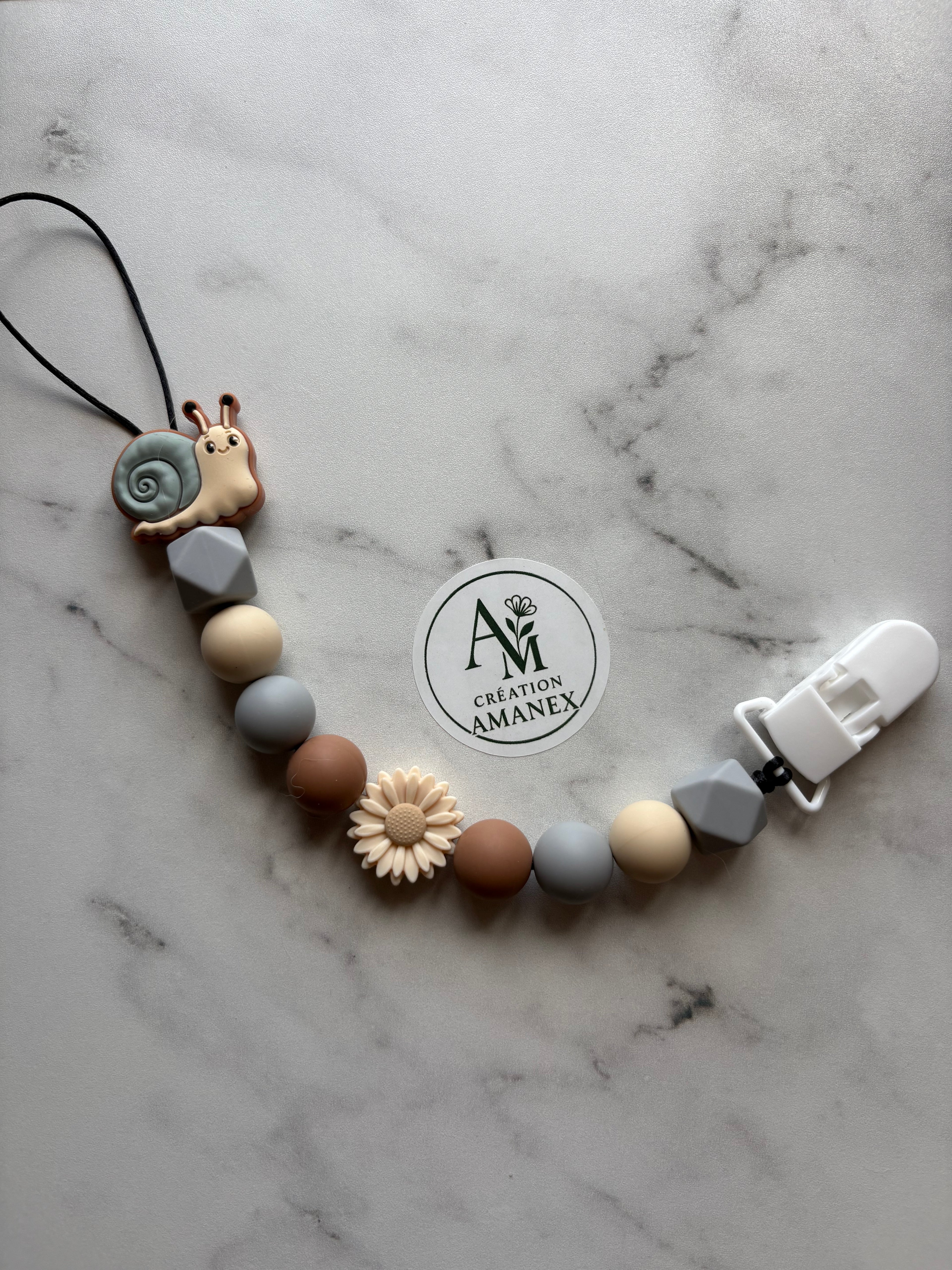 Attache suce Escargot gris/fleur beige