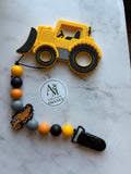 Attache suce et Jouet de dentition Chargeuse