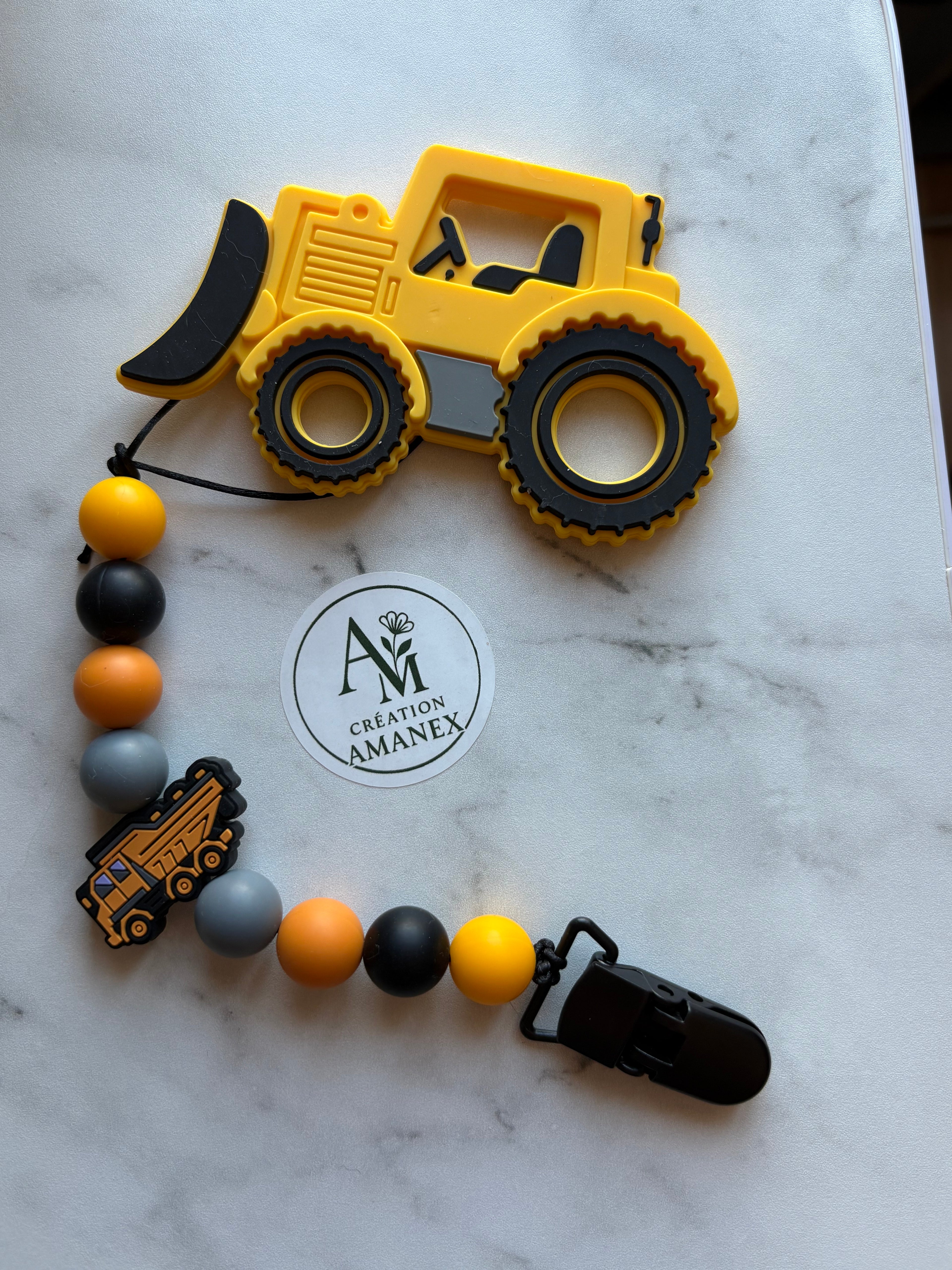 Attache suce et Jouet de dentition Chargeuse