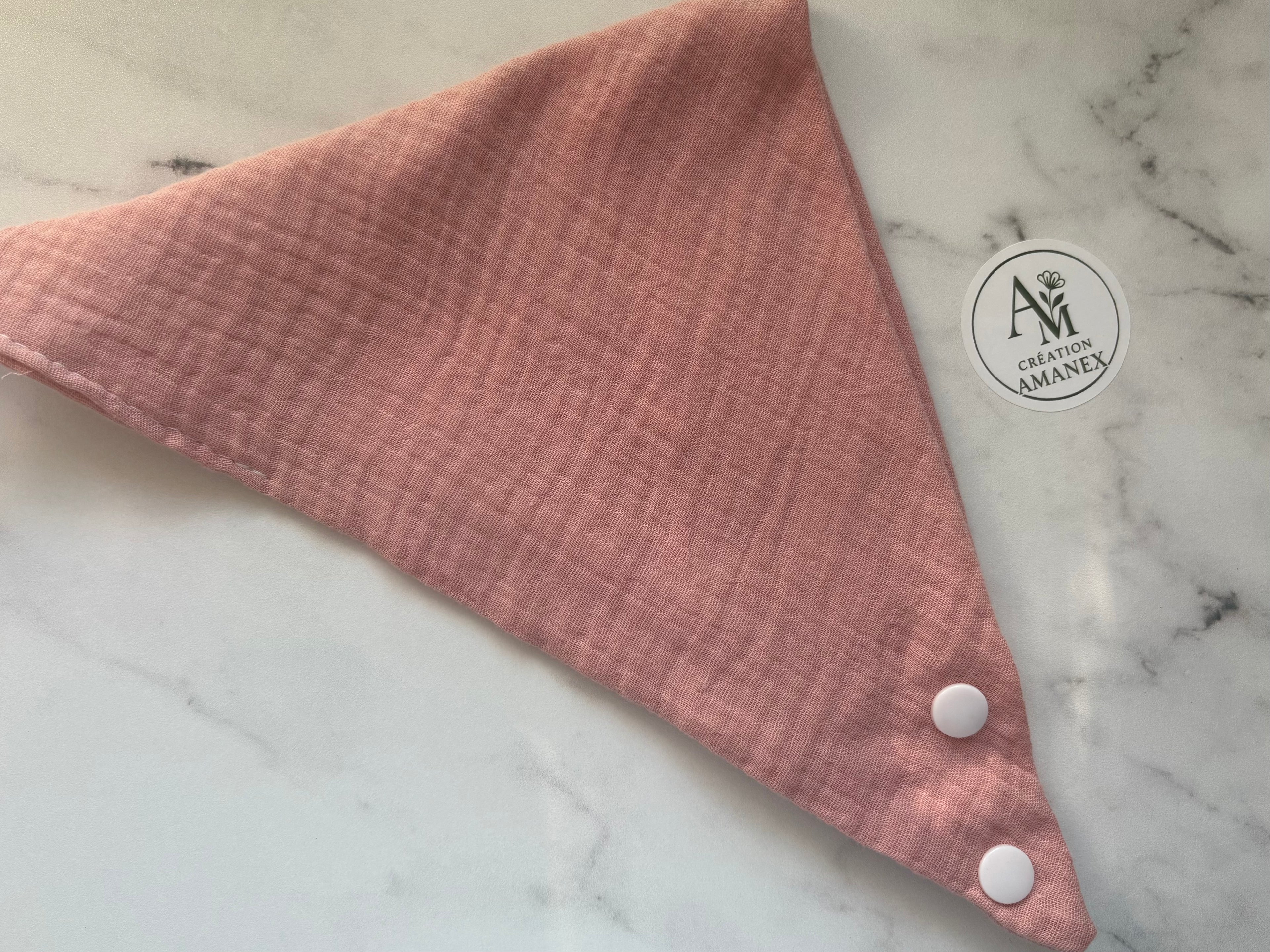 Bavoir en coton uni rose pale