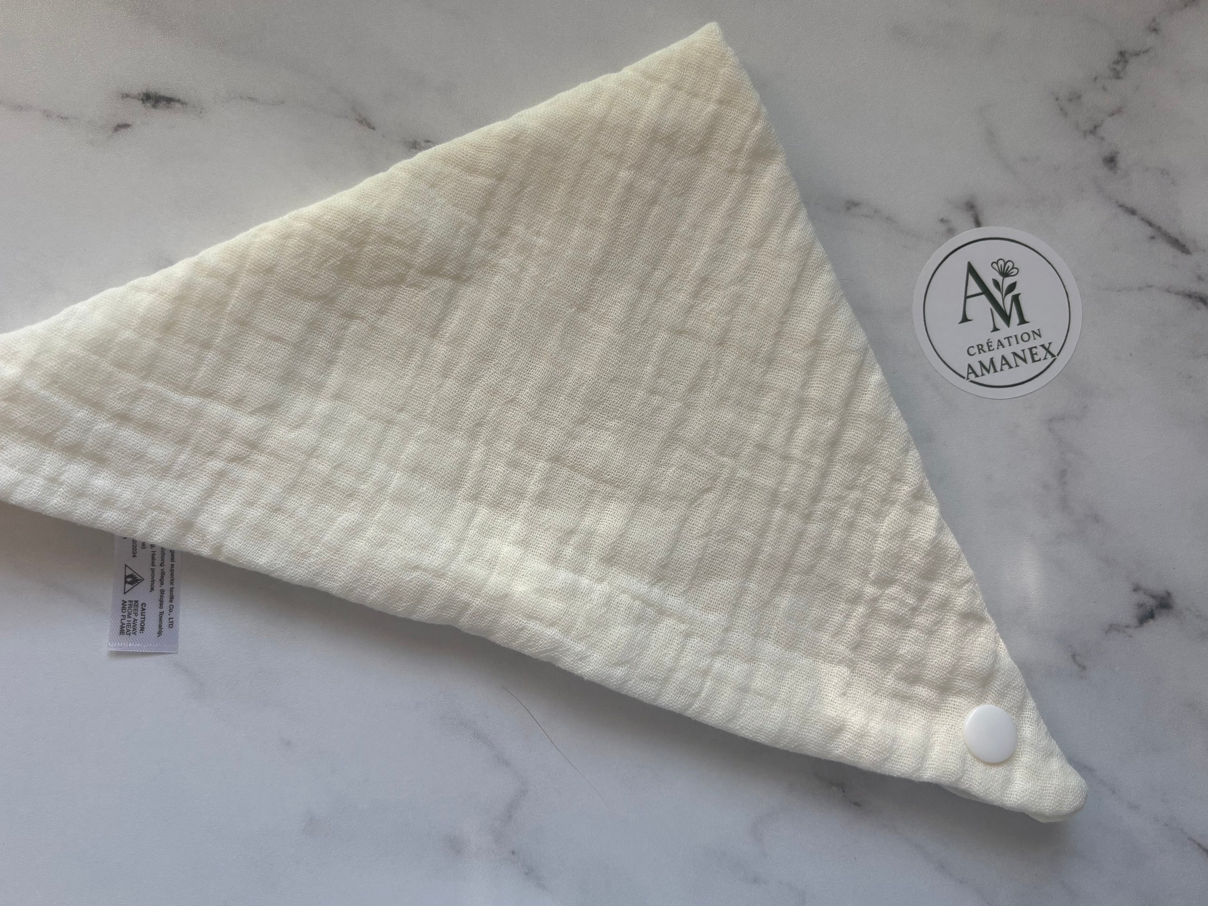 Bavoir uni en coton crème